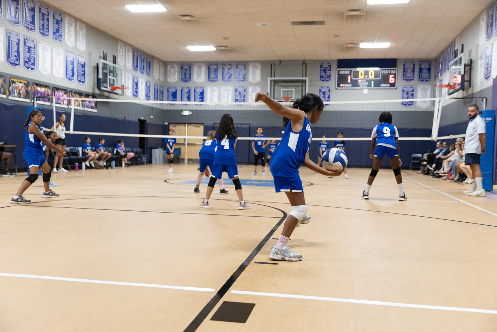GPS player serving during a volleyball match
